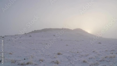 Frosty, snow covered landscape.  White landscape covered in hoar frost. photo