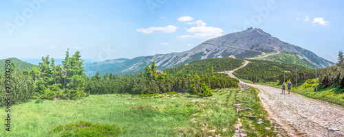 Tourists on the trail in the Karkonosze Mountains, Sniezka summit 1603 m n.p.m., Poland, Karkonosze National Park, Tourist Routes, Tourists, Trail photo