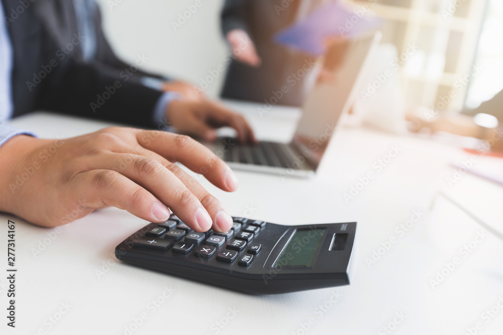 Financial Business man Accounting Calculating Cost Economic budget investment and saving concept Financial Business man Accounting Calculating Cost Economic budget investment and saving concept