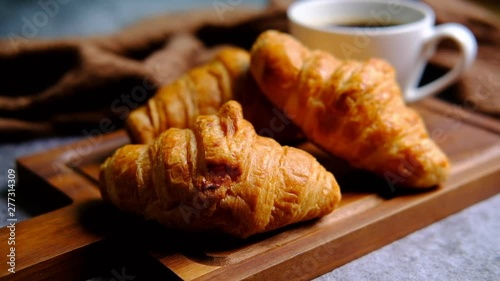 Wallpaper Mural Breakfast with fresh croissants and cup of black coffee on wooden board Torontodigital.ca