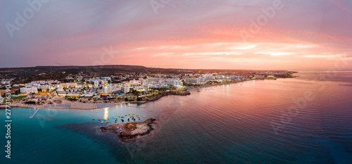 Aerial drone shot of Protaras city at sunset