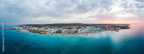 Aerial drone shot of Protaras city at sunset