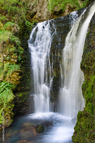 First waterfall of the Enna river springs. Val Taleggio