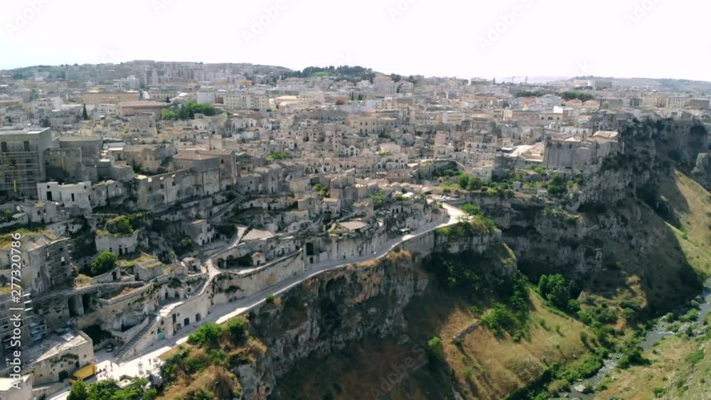 Aerial view of ancient town of Matera Sassi di Matera in sunny day, Basilicata, southern Italy Aerial view of ancient town of Matera Sassi di Matera in sunny day, Basilicata, southern Italy