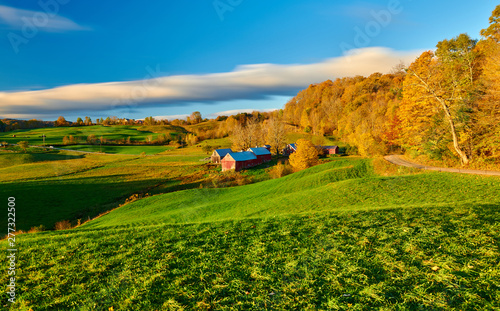 Jenne Farm with barn at sunny autumn morning in Vermont, USA photo