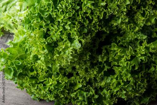 green salad on woodenbackground