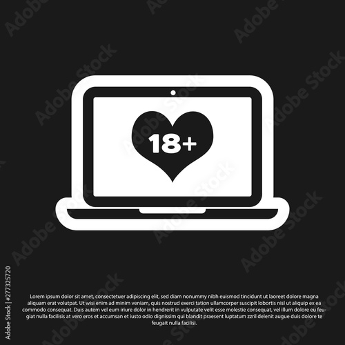 Black Laptop computer with 18 plus content heart icon isolated on black background. Age restriction symbol. 18 plus content sign. Adult channel. Vector Illustration