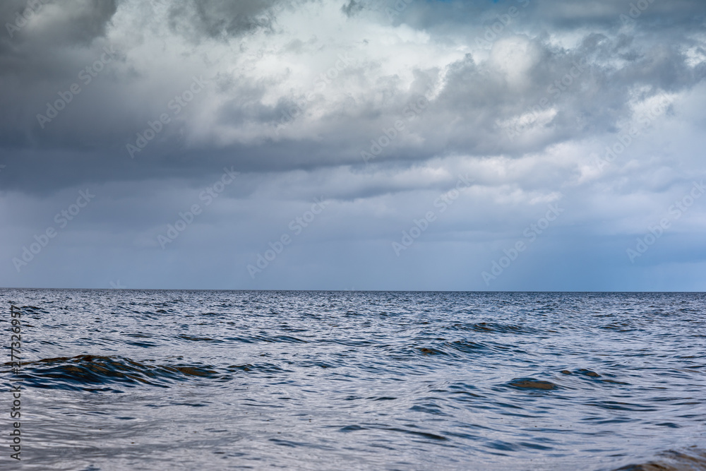 Obraz premium Dark sky over gulf of Riga, Baltic sea.