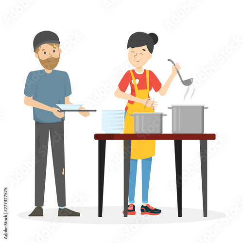 Volunteer feed homeless man. Help and support