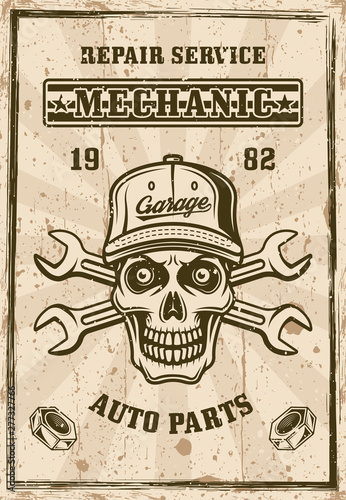 Mechanic skull in cap and two wrenches poster