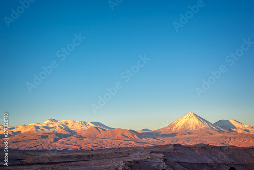 Andes mountain range at sunset, view from Moon Valley in Atacama desert, Chile