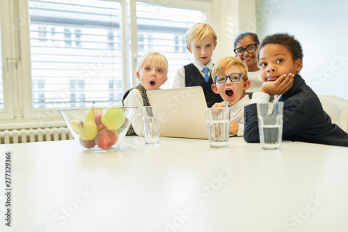 Wallpaper Mural Children as business people in a computer course Torontodigital.ca