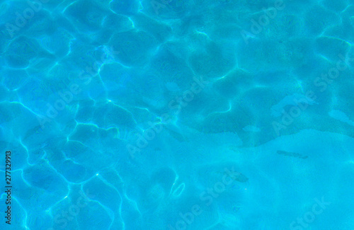 Blue ripped water in swimming pool