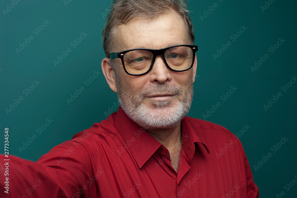 Close-up portrait of positive elderly handsome man Close-up portrait of positive elderly handsome man