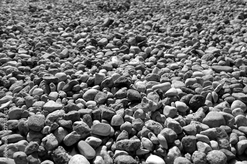 Pile of small gravel stones in black and white.