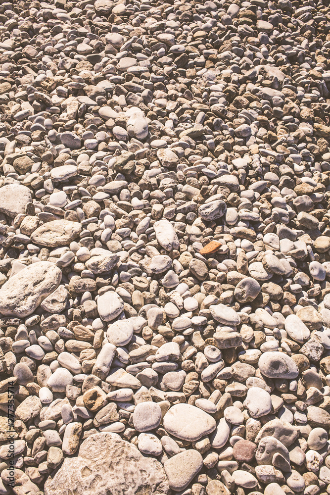 Beach stones background. Pebbles on coast of Montenegro. Beach stones background. Pebbles on coast of Montenegro.