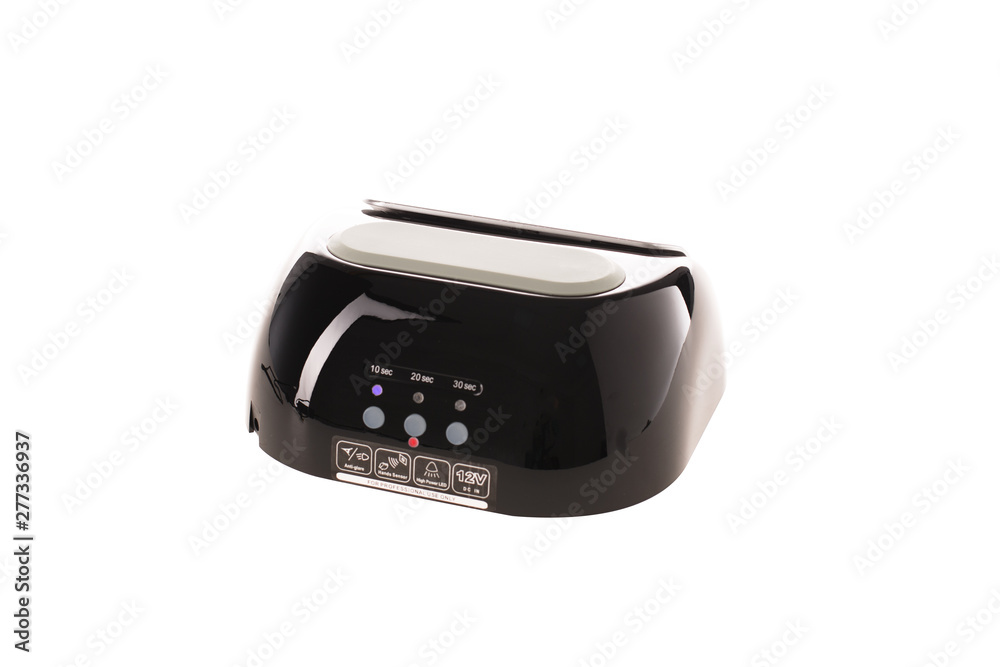 Ultraviolet led manicure black lamp for drying nails. Isolated on white background Ultraviolet led manicure black lamp for drying nails. Isolated on white background