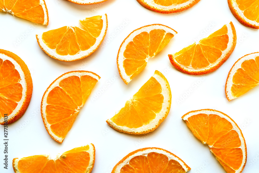 Orange fruit slices isolated on the white background Orange fruit slices isolated on the white background