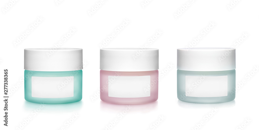Frosting glass cosmetics containers with blank labels against white background Frosting glass cosmetics containers with blank labels against white background
