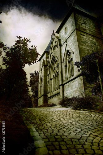 Canvas Print Gothic church on a hill. Dark edition to give a sinister look