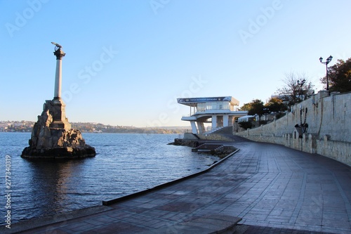 View of Monument to the Sunken Ships in Sevastopol in Crimea. It was designed by Amandus Adamson and built by Valentin Feldmann in 1905. Travel and tourism, Culture, history and architecture concept. photo