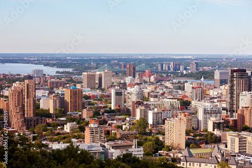 Montreal city skyline view from Mount Royal on a sunny summer afternoon in Quebec  Canada