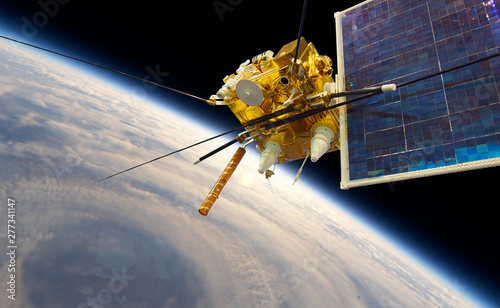 Modern meteorological satellite at the Earth orbit photo