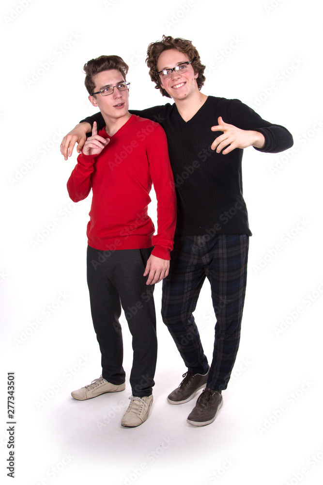 Two fun attractive students. White background. Study. Two fun attractive students. White background. Study.