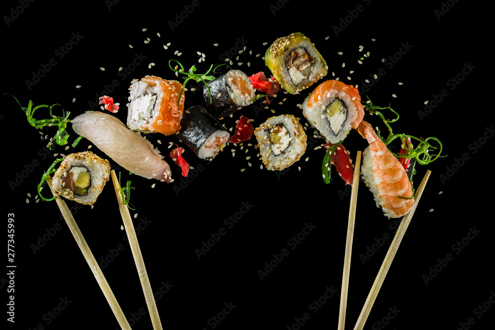 Seamless pattern with sushi. Food abstract background. Flying sushi, sashimi and rolls isolated on the black background. - obrazy, fototapety, plakaty 