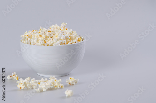 Buttery popcorn in white ceramic bowl