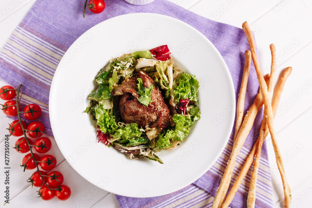 Tasty Roast Pork Meat Tenderloin Greens Salad. Palatable Beef Loin Chop