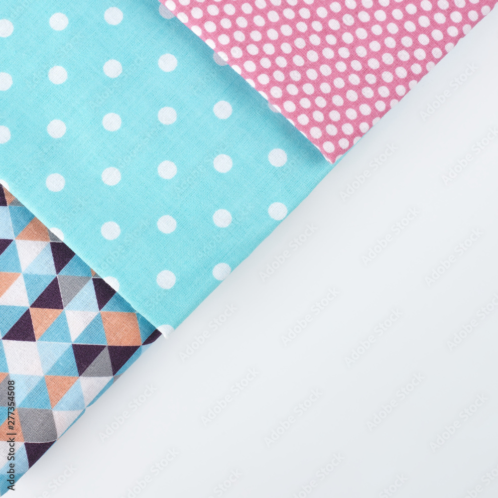 Obraz premium Colored Cotton textile - close up of fabric texture. Cotton Fabric Texture. Top View of Cloth Textile Surface. Text Space. Abstract background and texture for designers.