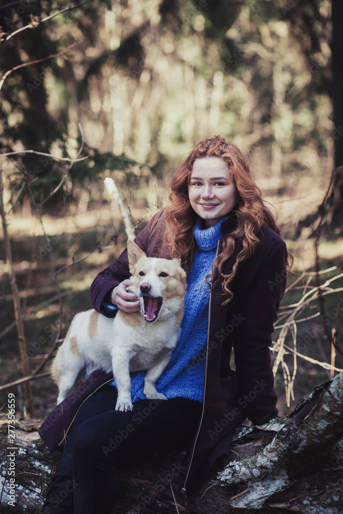 girl with dog in park. happiness and friendship. pet and woman girl with dog in park. happiness and friendship. pet and woman