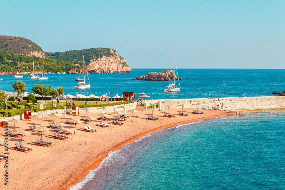 Picturesque summer view to the Adriatic sea coast with private beach of Sveti Stefan island in Montenegro
