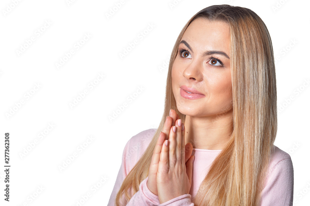 Portrait of beautiful woman praying isolated on white background Portrait of beautiful woman praying isolated on white background