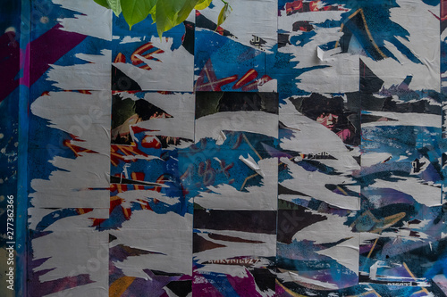 Old Urban Street Billboard With Torn Posters And Stickers,