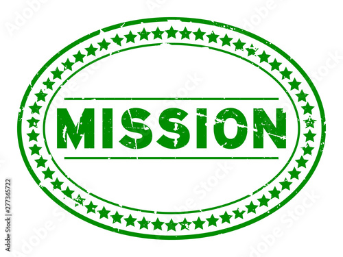 Grunge green mission word oval rubber seal stamp on white background