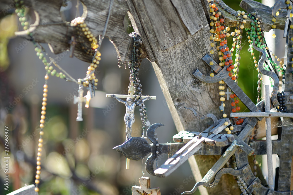 Various wooden crosses and crucifixes on the Hill of Crosses, a site of pilgrimage near Siauliai, Lithuania.