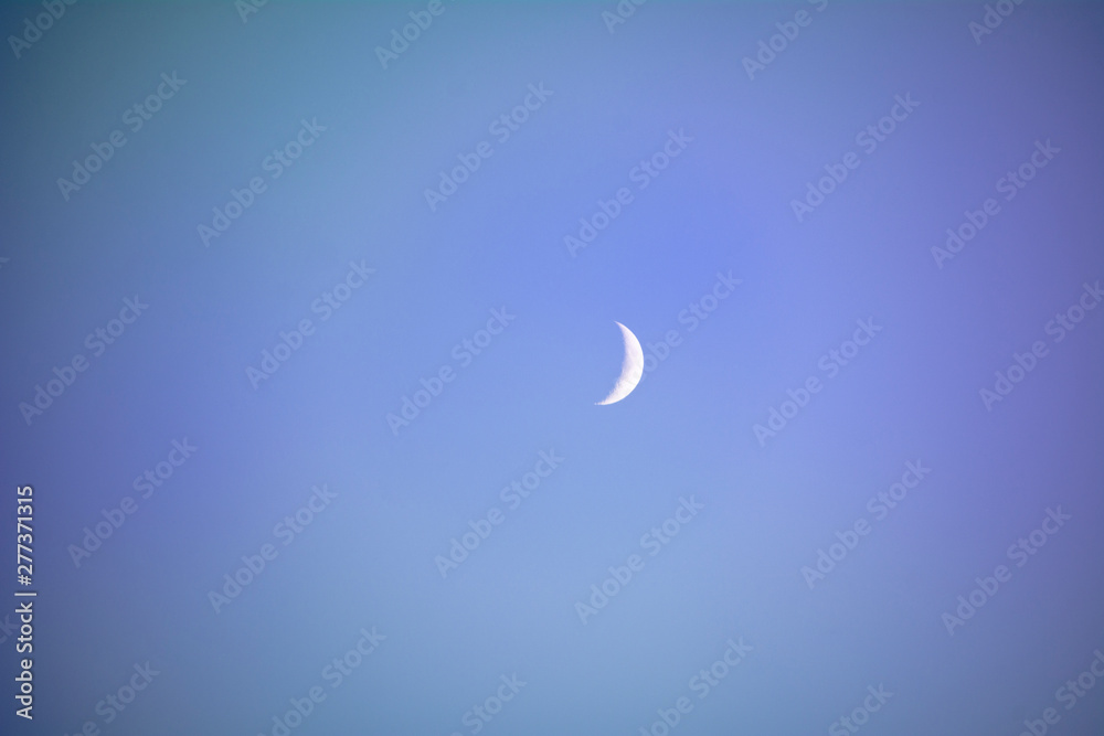 Crescent moon isolated on blue night background. Crescent moon isolated on blue night background.