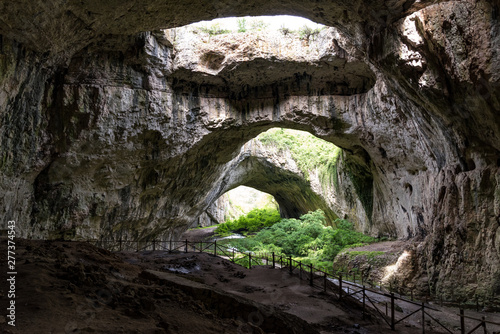 Devetàshka cave is a large karst cave around 7 km east of Letnitsa and 15 km northeast of Lovech, near the village of Devetaki