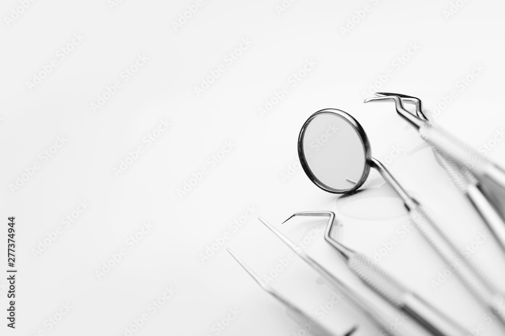 Dental tools on white background. Medical technology concept. Dental  hygiene. Cure concept. Dentist tools. Dental equipment. Stock Photo