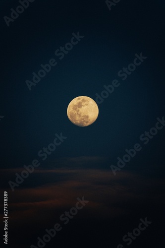 moon. Colorful sky with cloud and bright  moon. Serenity nature background, outdoor at nighttime. Cross process.