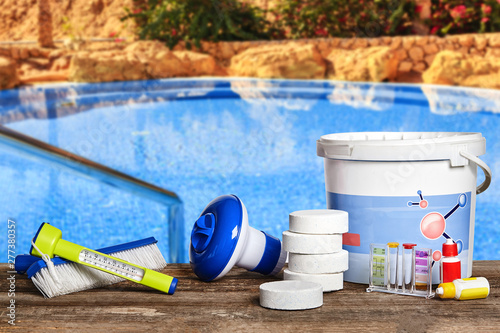 Obraz na płótnie Equipment with chemical cleaning products and tools for the maintenance of the swimming pool. w salonie