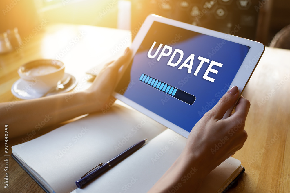 Update status bar on device screen. Software development and technology concept. Update status bar on device screen. Software development and technology concept.