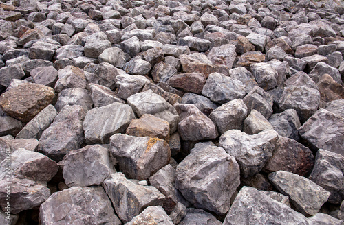 Close up of boulders sea defence background photo