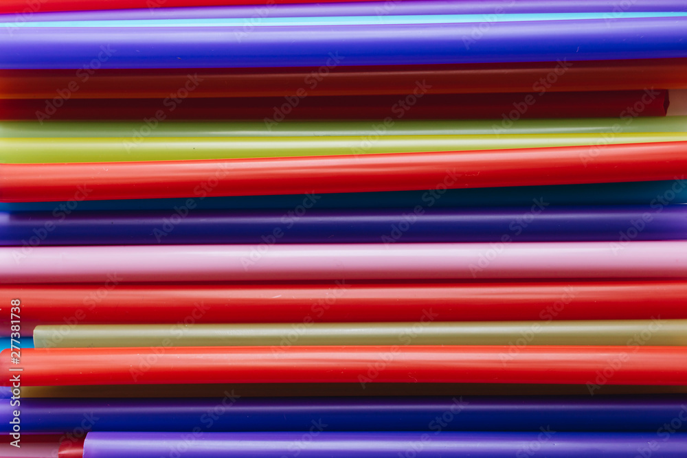 Pile of colorful cocktail straws over white background Pile of colorful cocktail straws over white background