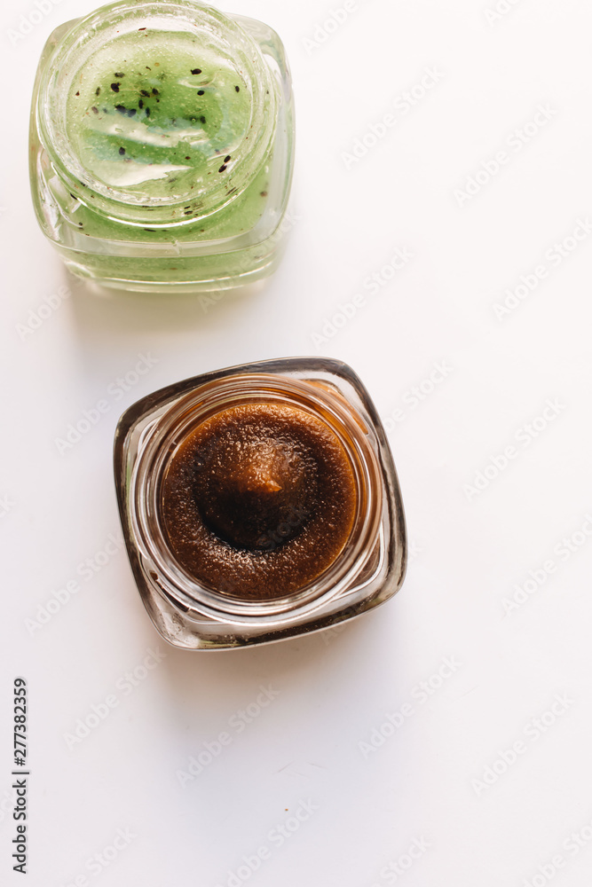 Chocolate cream in small jar on white background Chocolate cream in small jar on white background