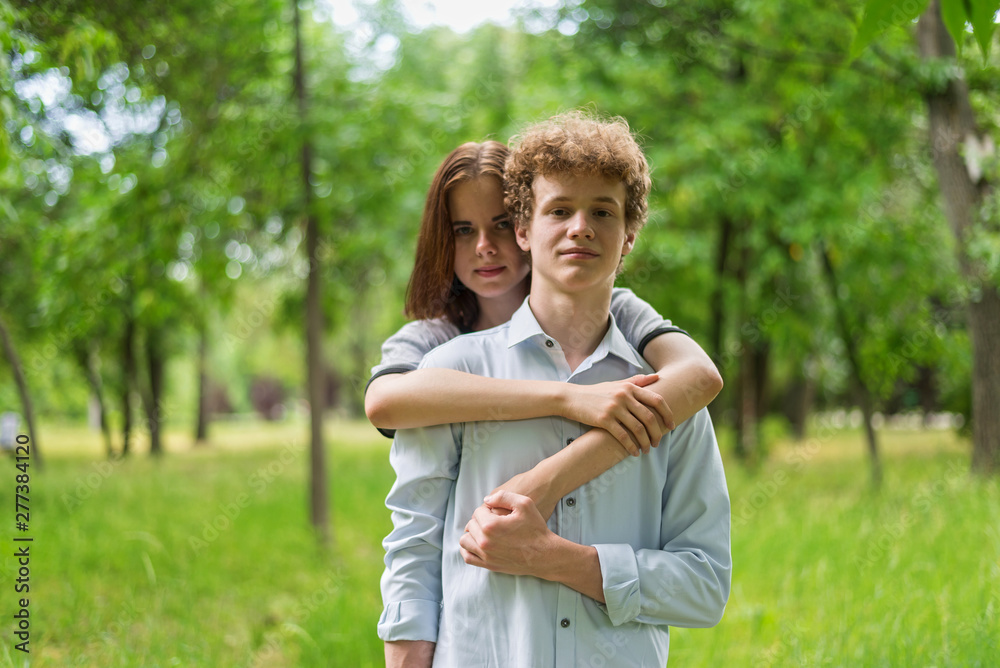 Young girl and boyfriend closeup, concept of happiness and love. Young girl and boyfriend closeup, concept of happiness and love.