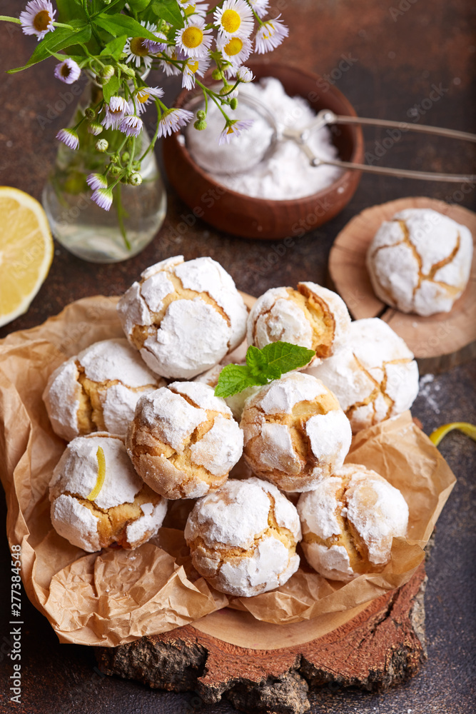 Fototapeta premium Lemon cookies with cracks. Delicious homemade sweet dessert. 