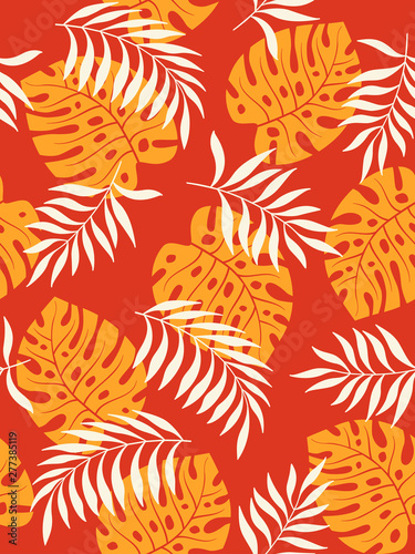Tropical leaves seamless pattern on orange background. Vector illustration.